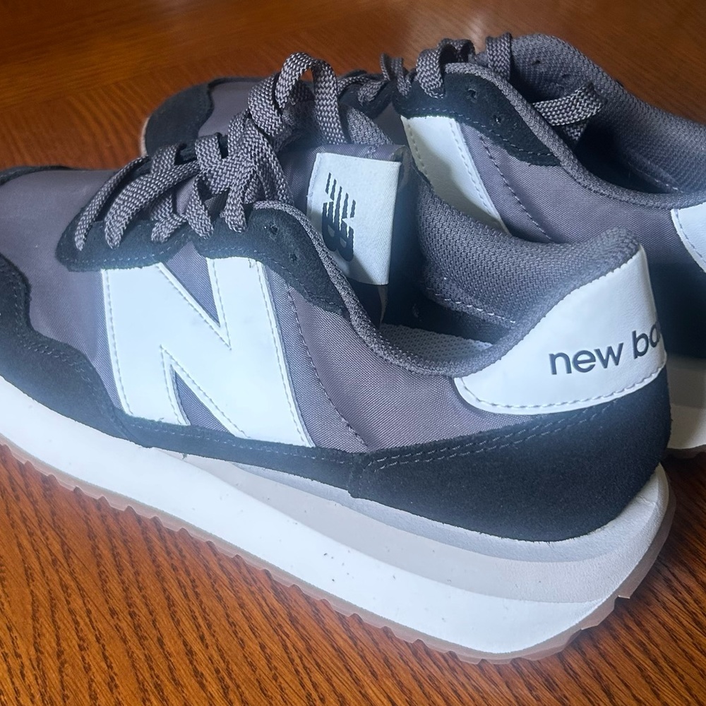New Balance 237 Charcoal and White Sneakers
Never worn! Brand new!